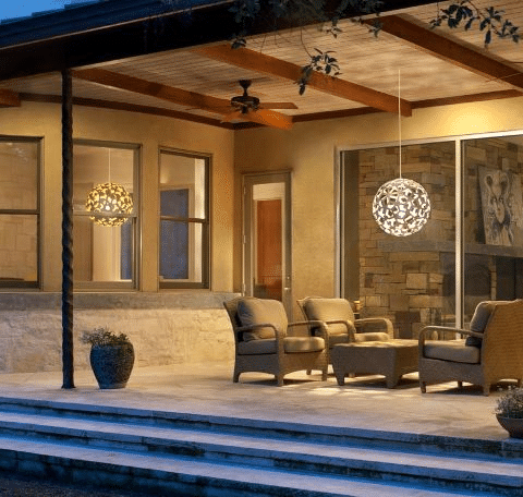 Elegant layered lighting over an outdoor living area
